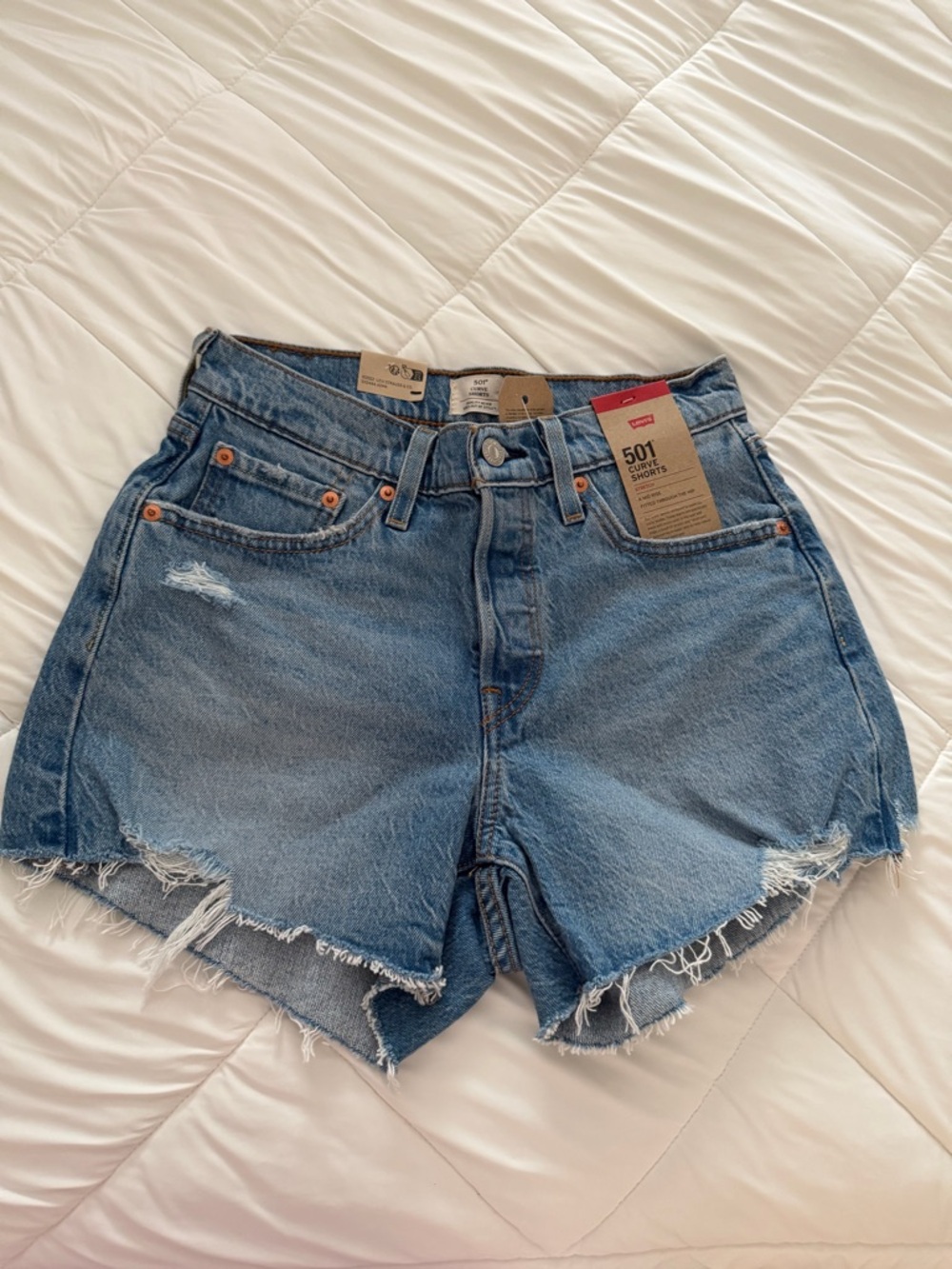 Levi's 501 Distressed Cutoff Denim Shorts in Blue